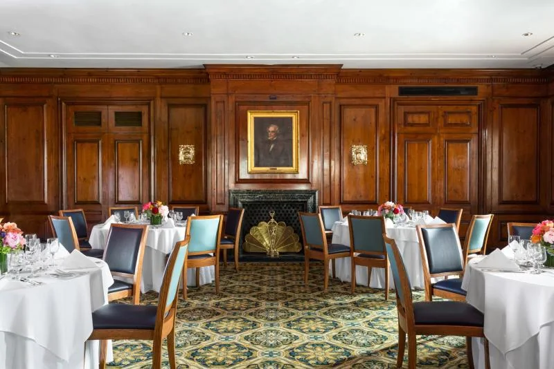 A wood-paneled dining and event room at The Yale Club.